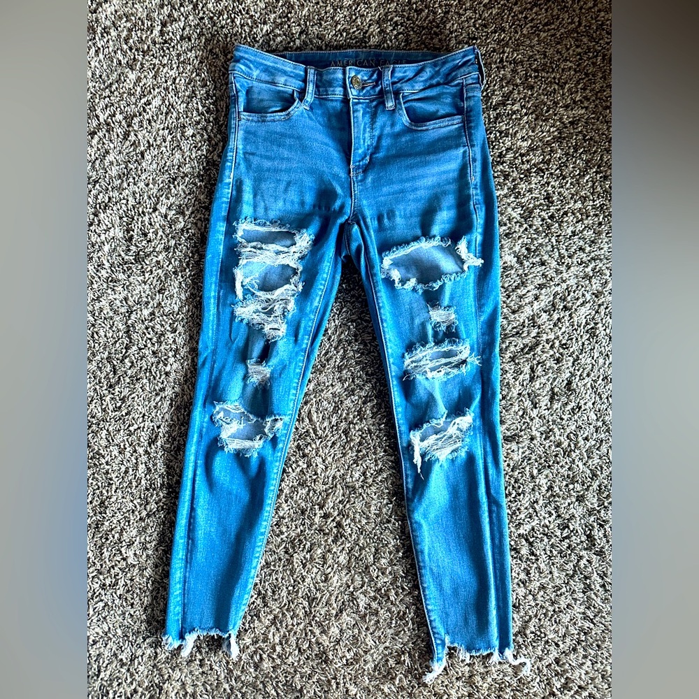 American Eagle extra distressed light wash jeans size 6